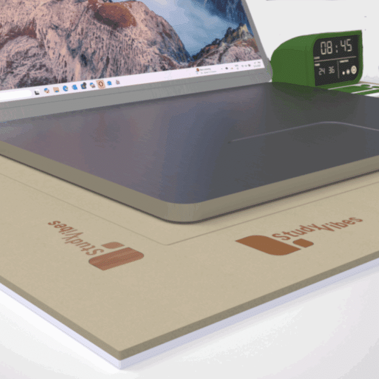 Close-up view of StudyVibes vibrating desk mat logo. 