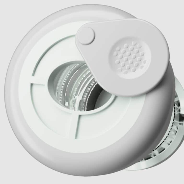 close up showing where the inhaler is inserted, with the slider cover moved to the side