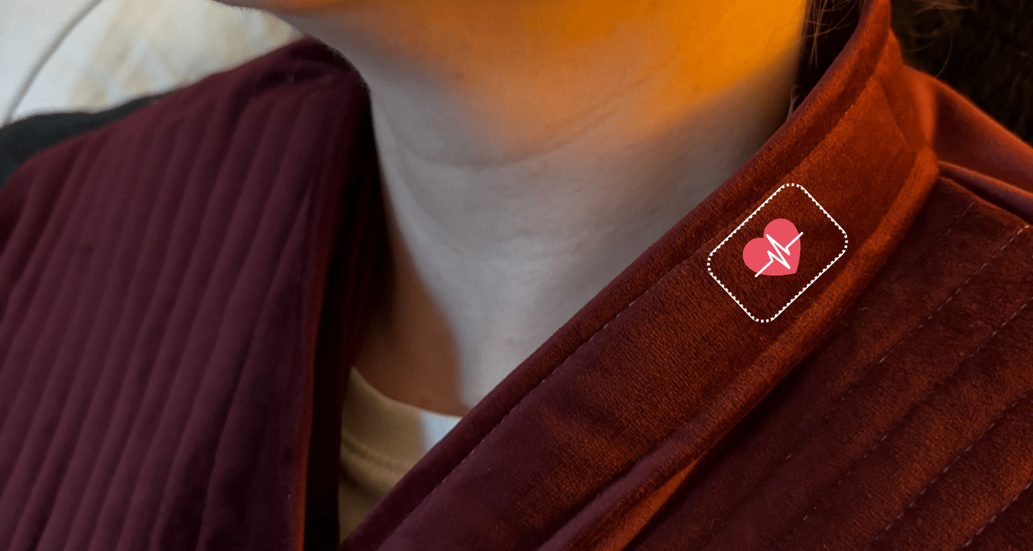Close up of collar with outline of rectangular shaped heart rate sensor.