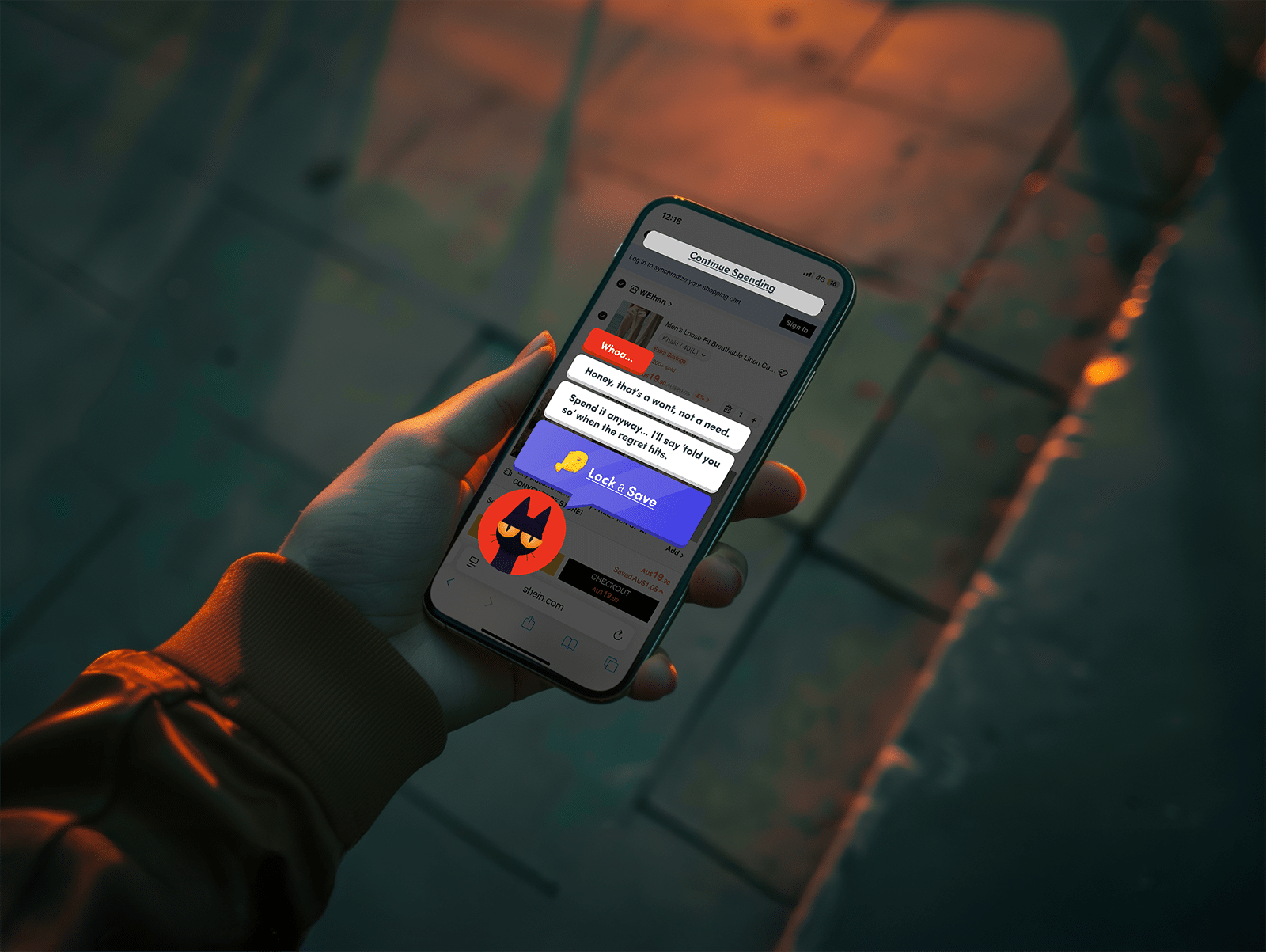 A person holds a smartphone in one hand while standing on a city street at sunset. On the phone screen, the Sketchy.live app displays playful prompts like “Honey, that’s a want, not a need” and a blue button labeled “Lock & Save.” The app’s cat mascot appears at the bottom of the screen. The warm orange lighting contrasts with the cool tones of the phone display, creating a cinematic look.